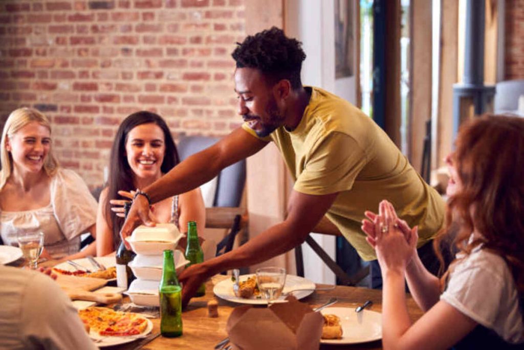 https://media.istockphoto.com/id/1411478525/photo/a-group-of-casual-businesspeople-is-sitting-in-a-restaurant-for-a-meeting-discussing-a.jpg?s=612x612&w=0&k=20&c=PgicjerfSd2hUXA4CN6ogOkbhcnaA-7myJOLnKXTLa0=